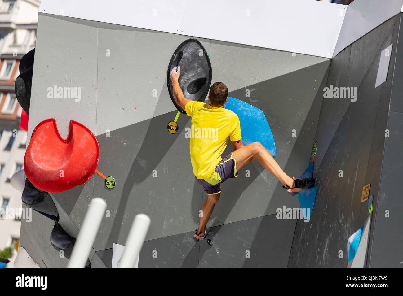 Climber. Young male and female competitors in the Madrid Block Climbing
