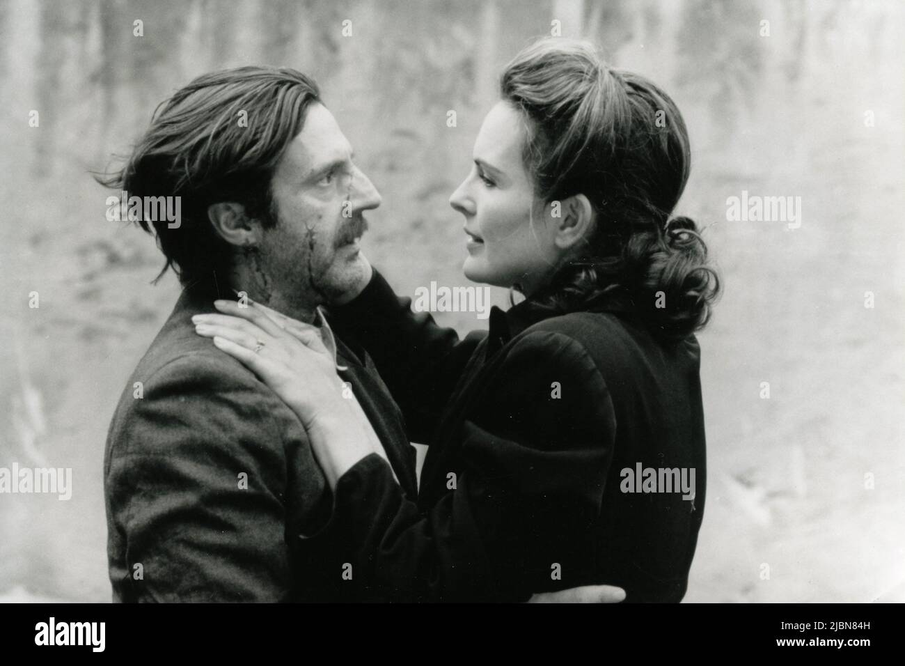 French actor Daniel Auteuil and actress Carole Bouquet in the movie Lucie Aubrac, France 1997 Stock Photo