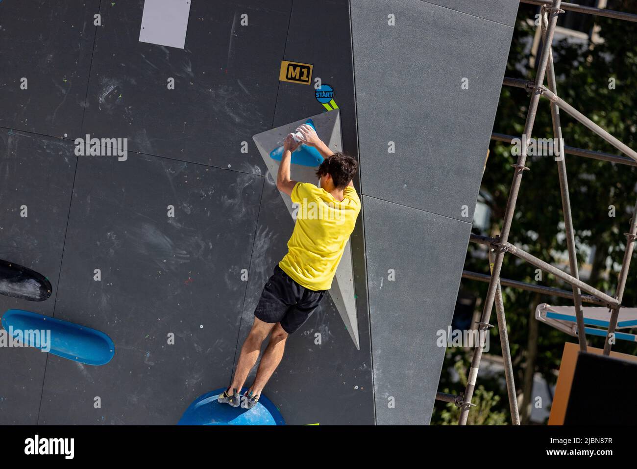Climber. Young male and female competitors in the Madrid Block Climbing