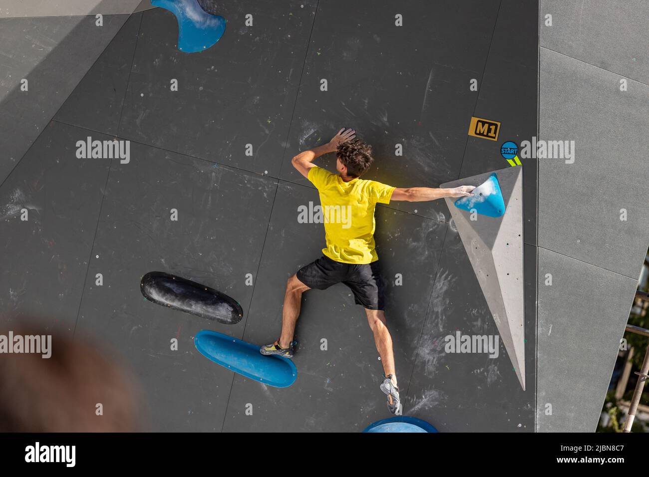 Climber. Young male and female competitors in the Madrid Block Climbing