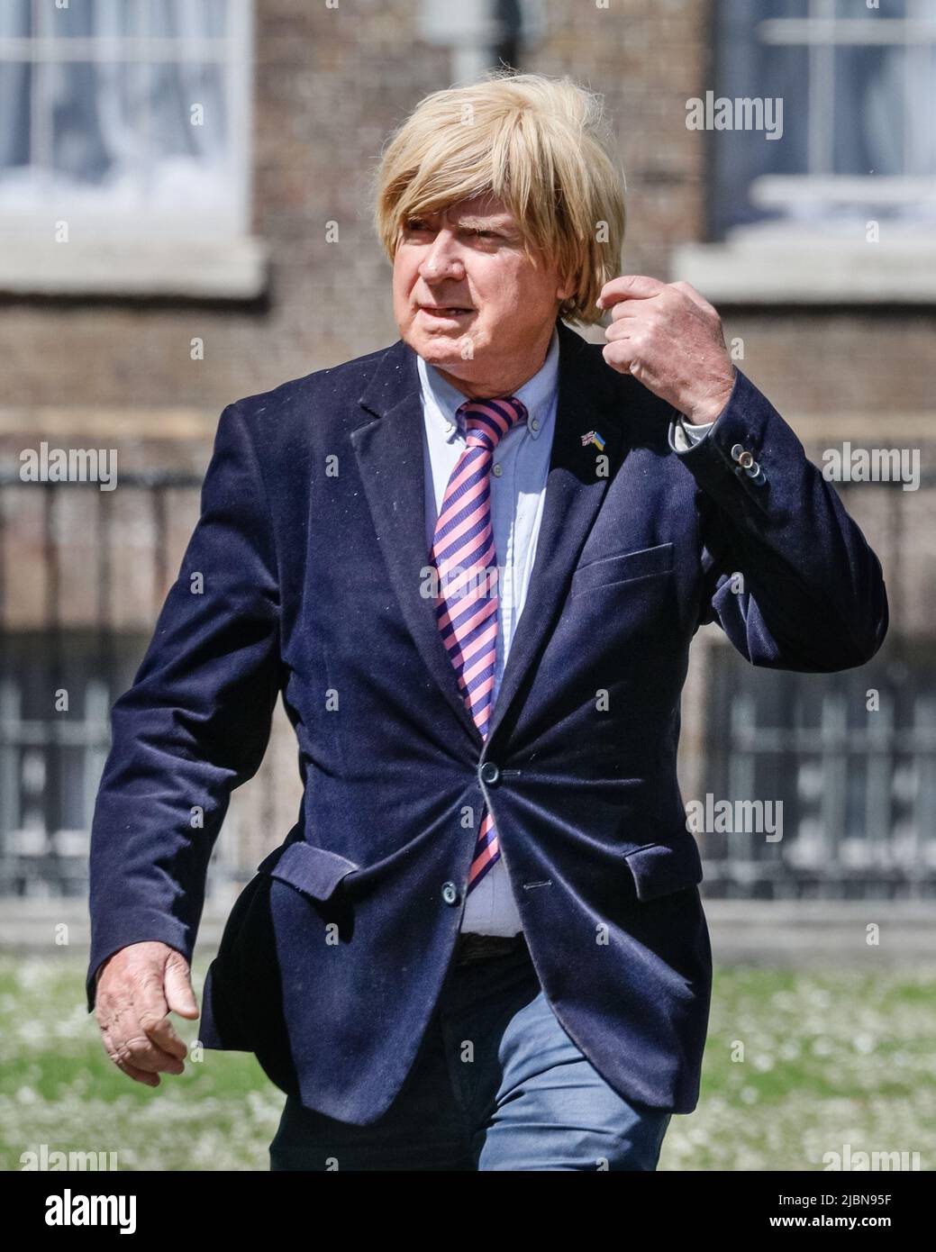 Westminster, London, UK. 07th June, 2022. Michael Fabricant, Conservative Party Member of Parliament for Lichfield. Politicians and commentators are interviewed on College Green in Westminster to give their reactions to yesterday's vote of confidence in the PM and the general political situation. Credit: Imageplotter/Alamy Live News Stock Photo