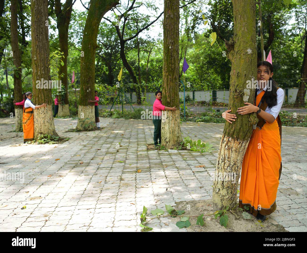 Child Subhas School children of Netaji Subhas Vidyaniketan pose and hug trees for ...