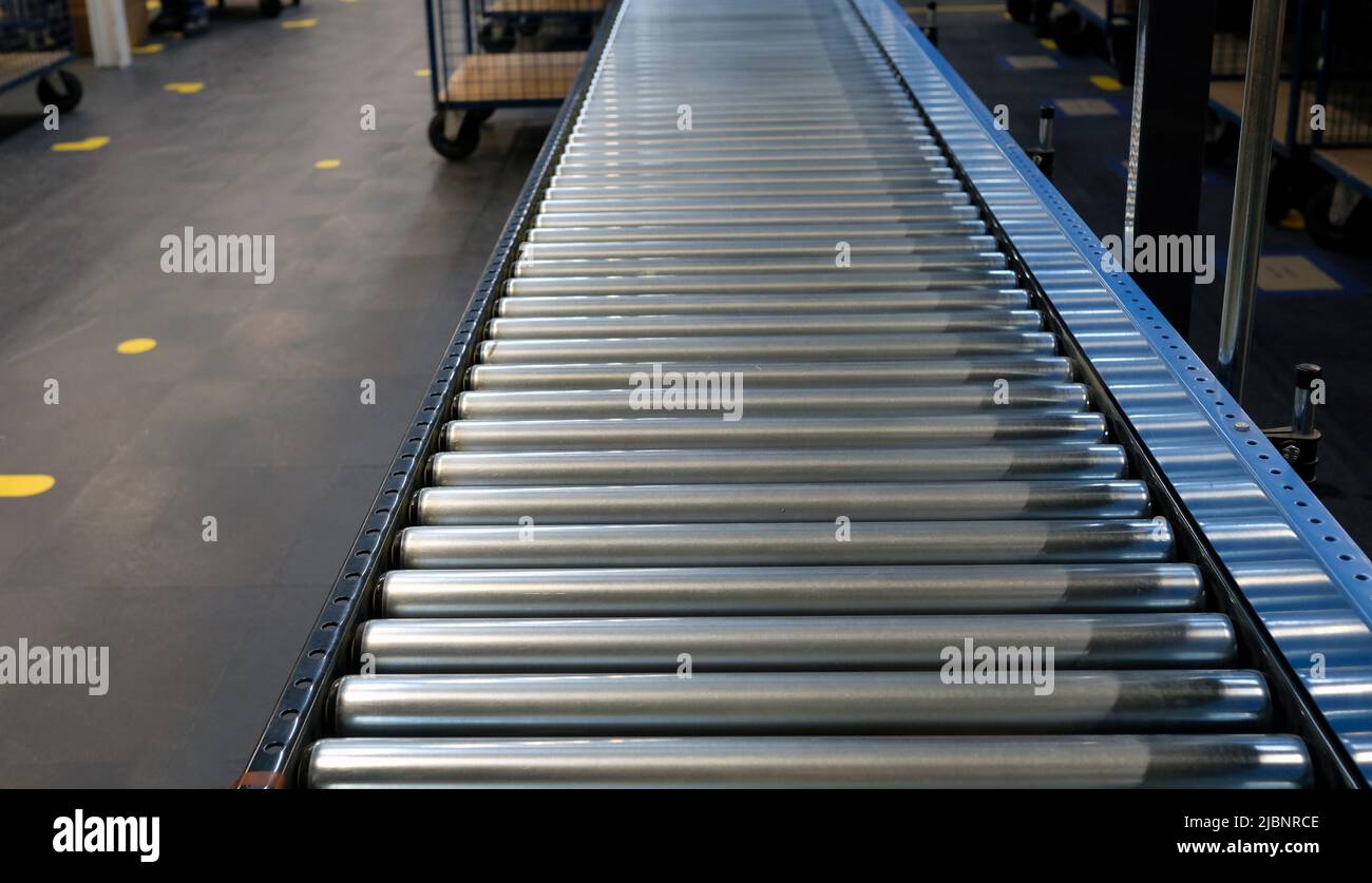 Conveyor belt inside a warehouse Stock Photo Alamy