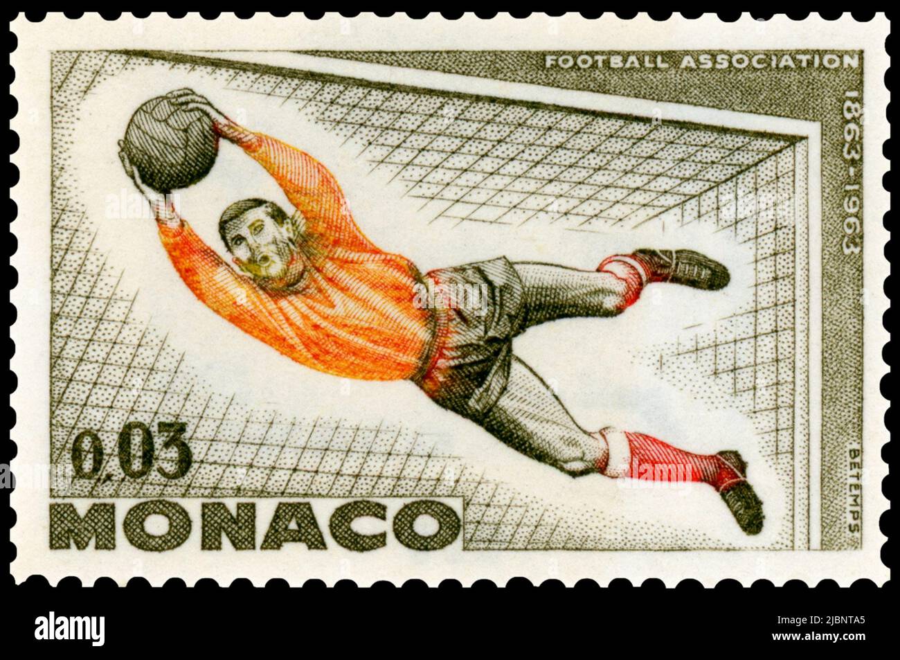Soccer goalkeeper on a 1963 Monaco postage stamp. Stock Photo