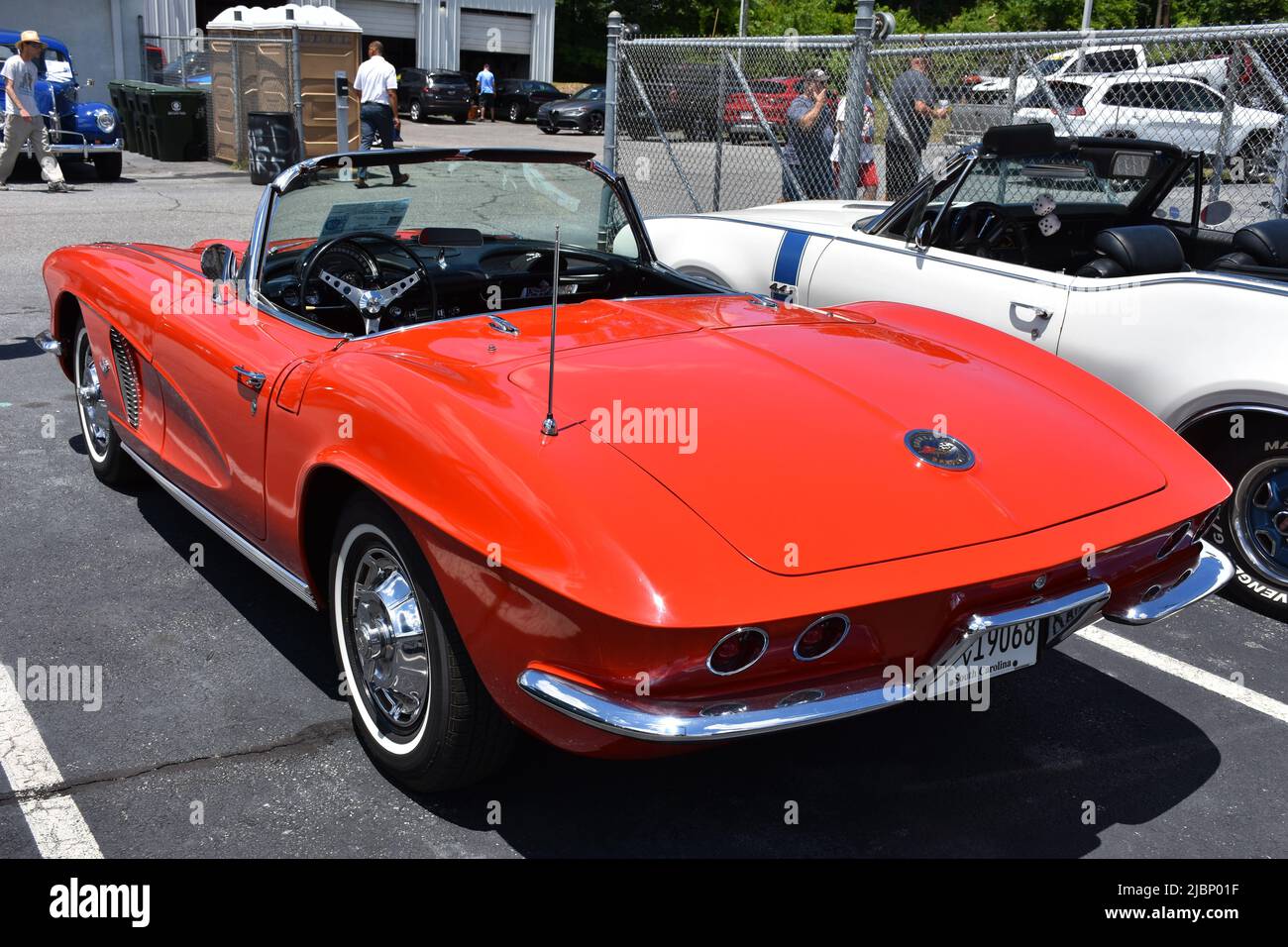 A Red 1962 Chevrolet Corvette on display at a car show. Stock Photo
