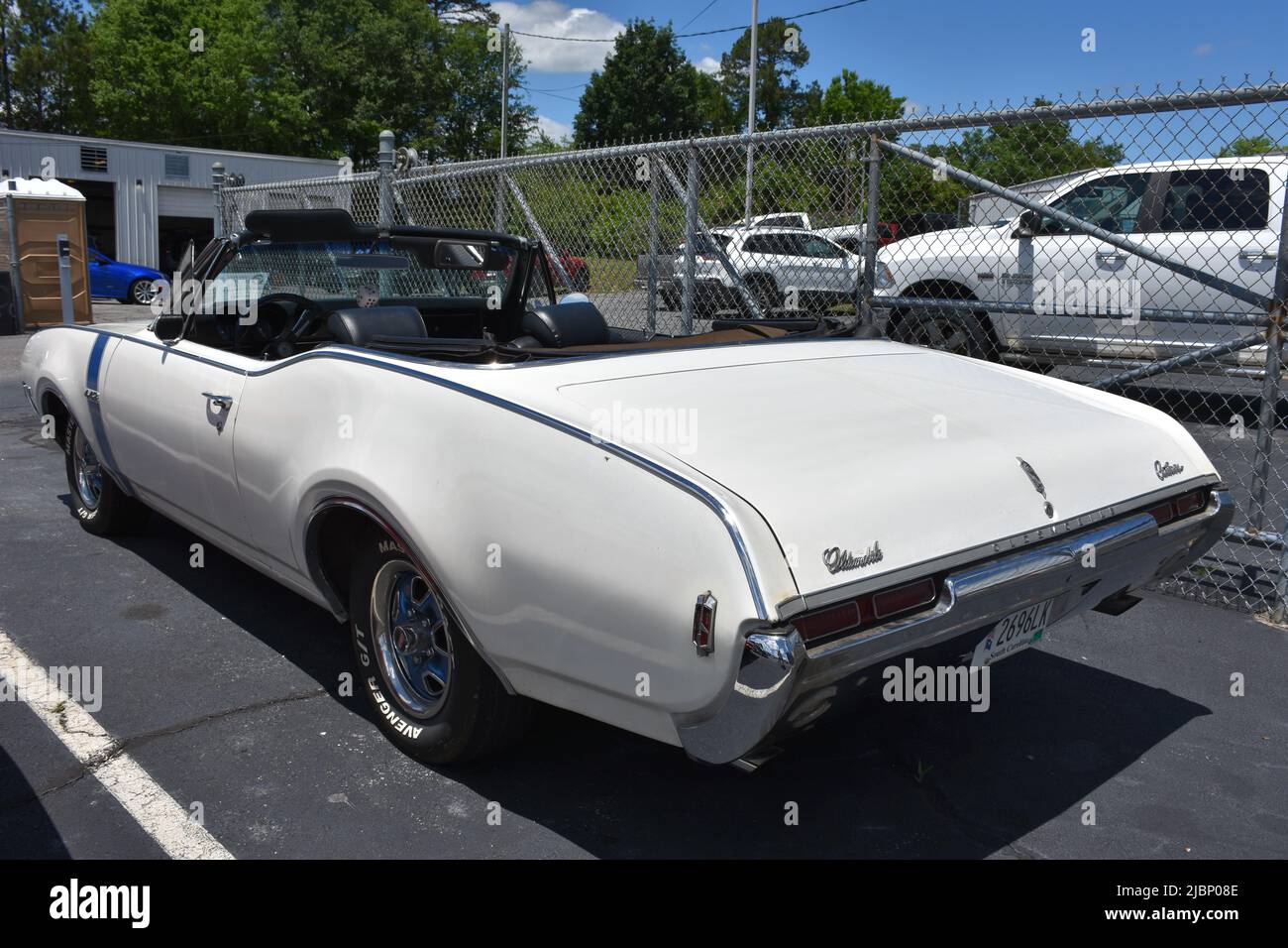 A 1968 Oldsmobile Cutlass 442 Convertible on display at a car show. Stock Photo