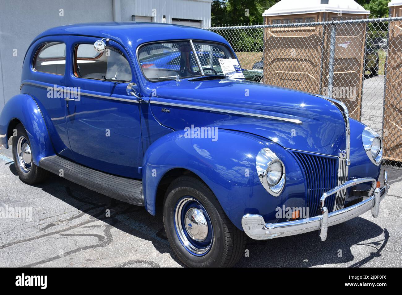 A 1940 Ford Tudor Coupe on display at a car show. Stock Photo