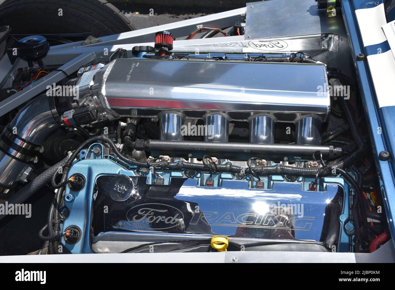A Ford Racing Engine on display at a car show. Stock Photo