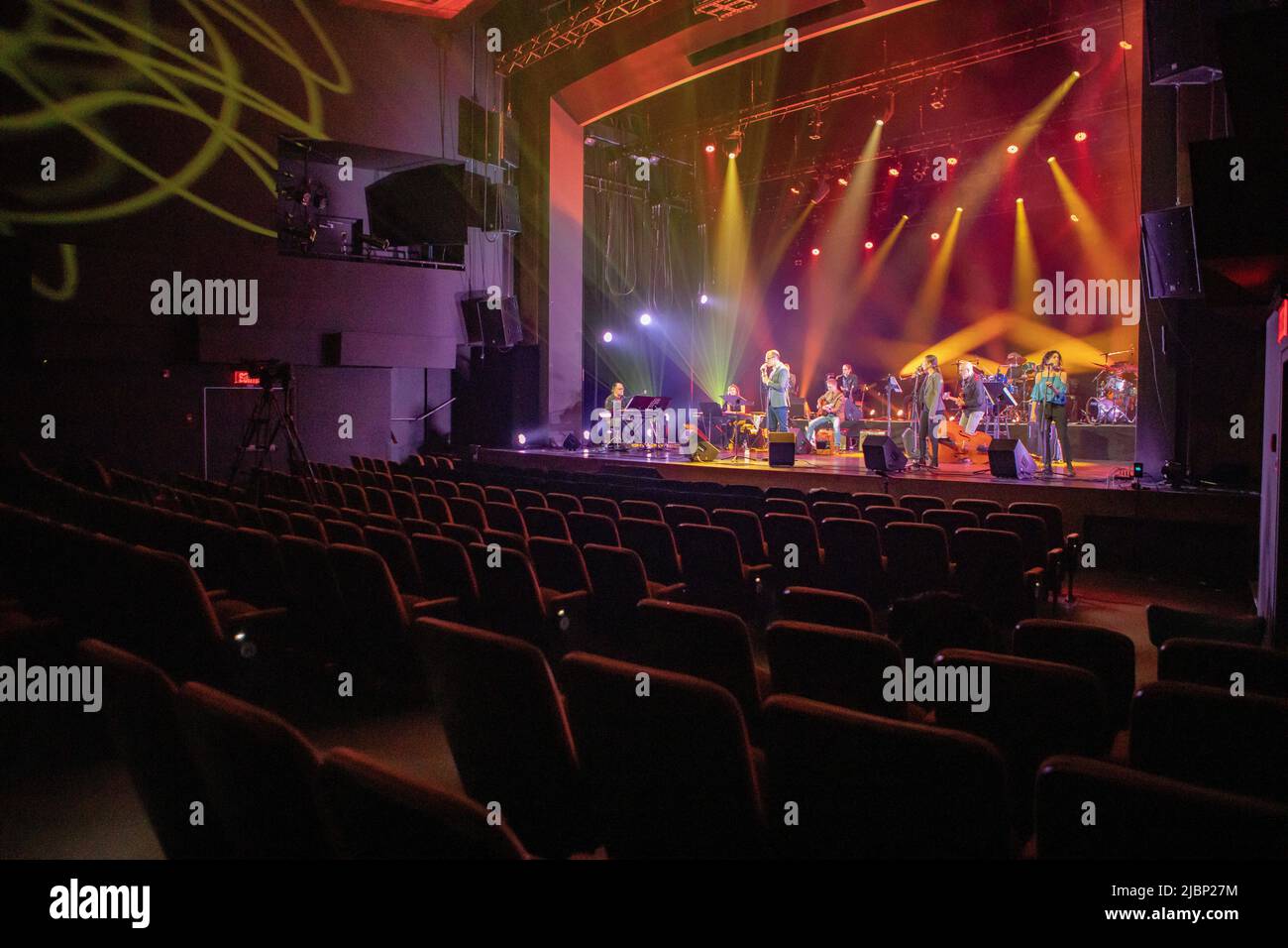 Live band on stage, filmed without a crowd because of Covid Stock Photo