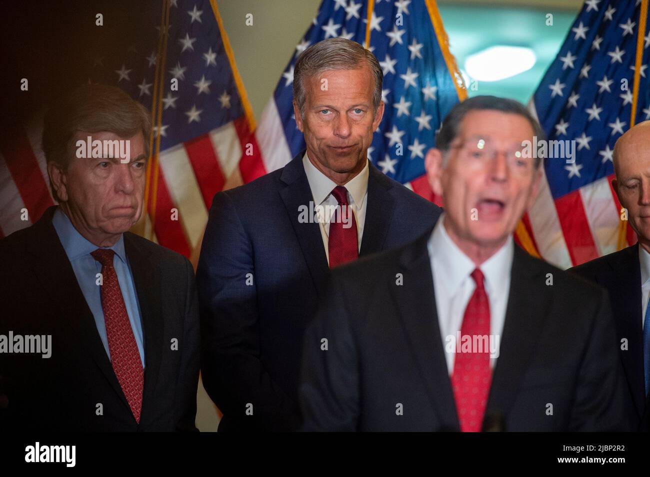 United States Senator Roy Blunt (Republican of Missouri), left, United States Senator John Thune (Republican of South Dakota), second from left, and United States Senator Rick Scott (Republican of Florida), right, listen as United States Senator John Barrasso (Republican of Wyoming) offers remarks during the Senate Republicanâs policy luncheon press conference, at the US Capitol in Washington, DC, Tuesday, June 7, 2022. Credit: Rod Lamkey/CNP Stock Photo