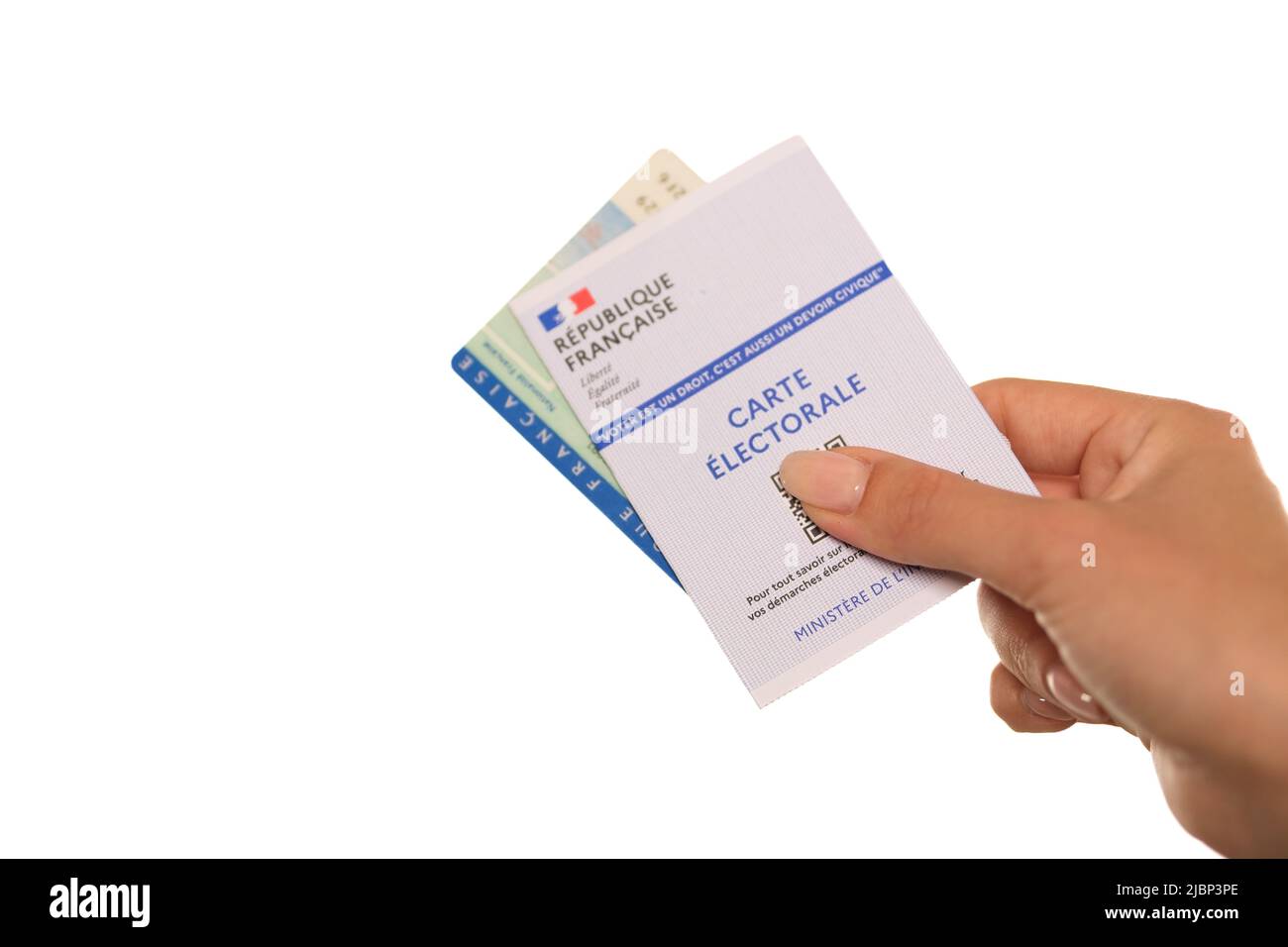 Paris, France May 26, 2022 A woman holding a French national identity card, and a French