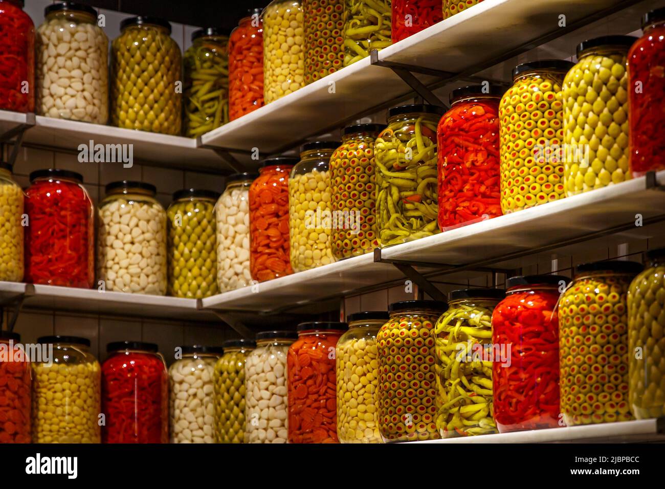 Pickled vegetables in jars on the shelf in the pantry Stock Photo Alamy