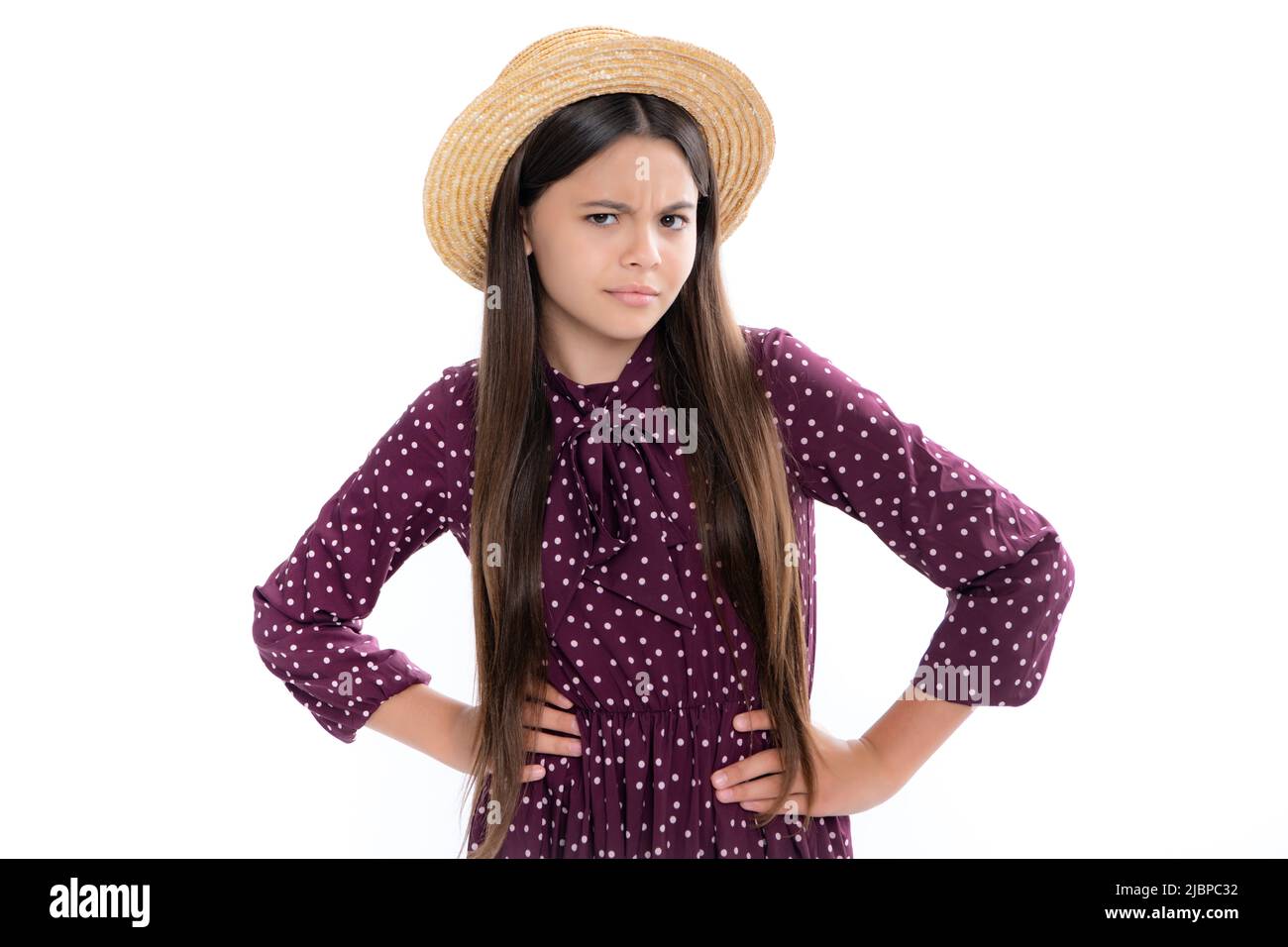 Unhappy upset teenager girl. Closeup portrait mad young child girl. Angry negative human emotion facial expression feeling attitude. Stock Photo