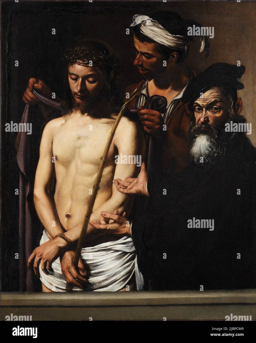 Ecce Homo by Caravaggio (1571-1610). The painting depicts the moment when Pontius Pilate presents a beaten and whipped Jesus to the crowd with the words Ecce Homo (Behold the man). Jesus has the crown of thorns on his head and a red or purple robe (to mock the claim to be king of the jews). Stock Photo