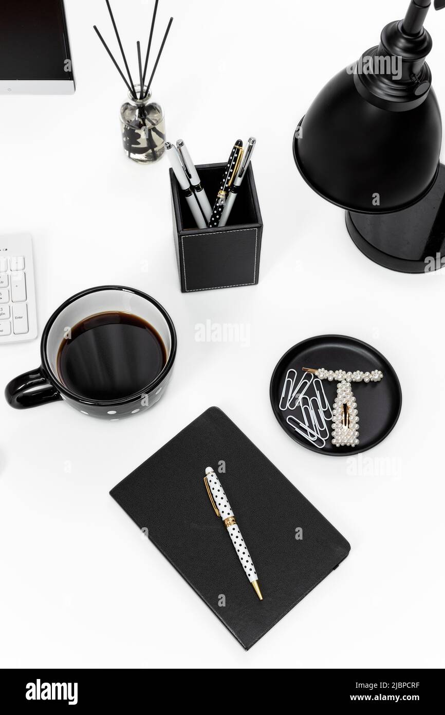 Black and White Styled Desk Workspace Stock Photo