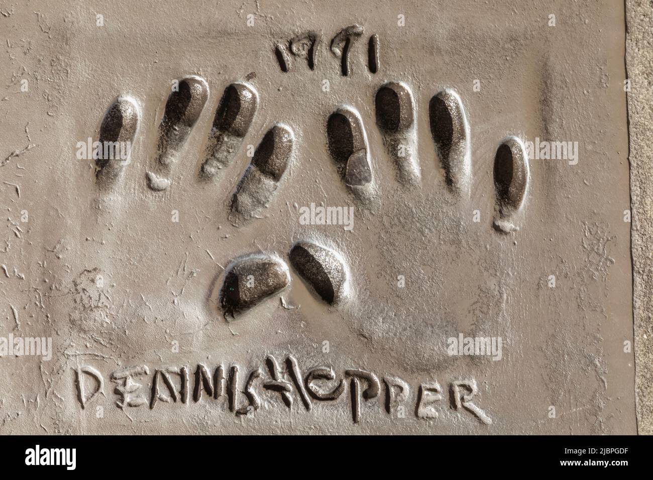 France, French Riviera, Cote d'Azur, Cannes, Palais des Festivals, Sidewalk Handprint of Dennis Hopper Stock Photo