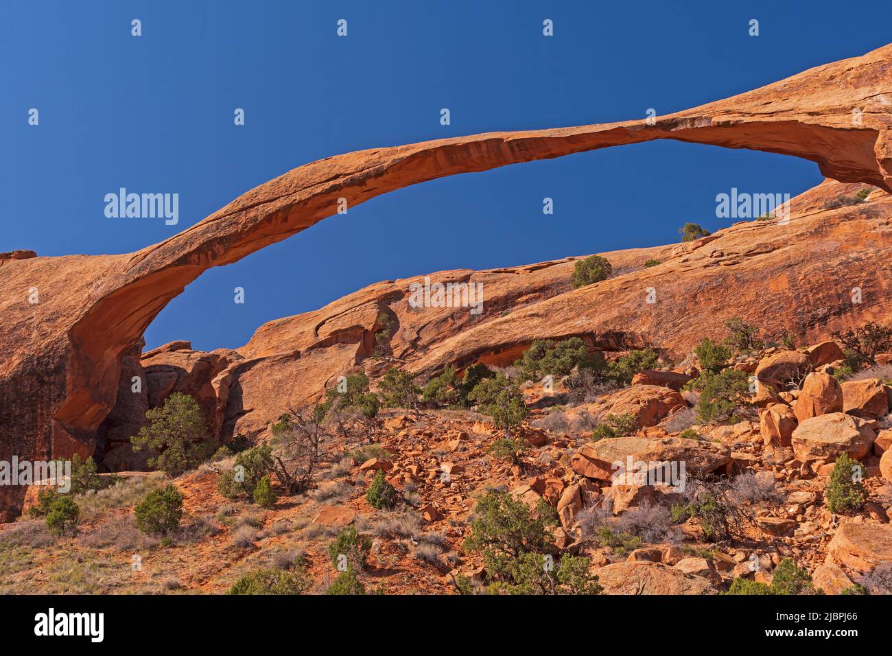 Landscape Arch Against a Blue Sky in the Devils Garden in Arches National Park in Utah Stock Photo