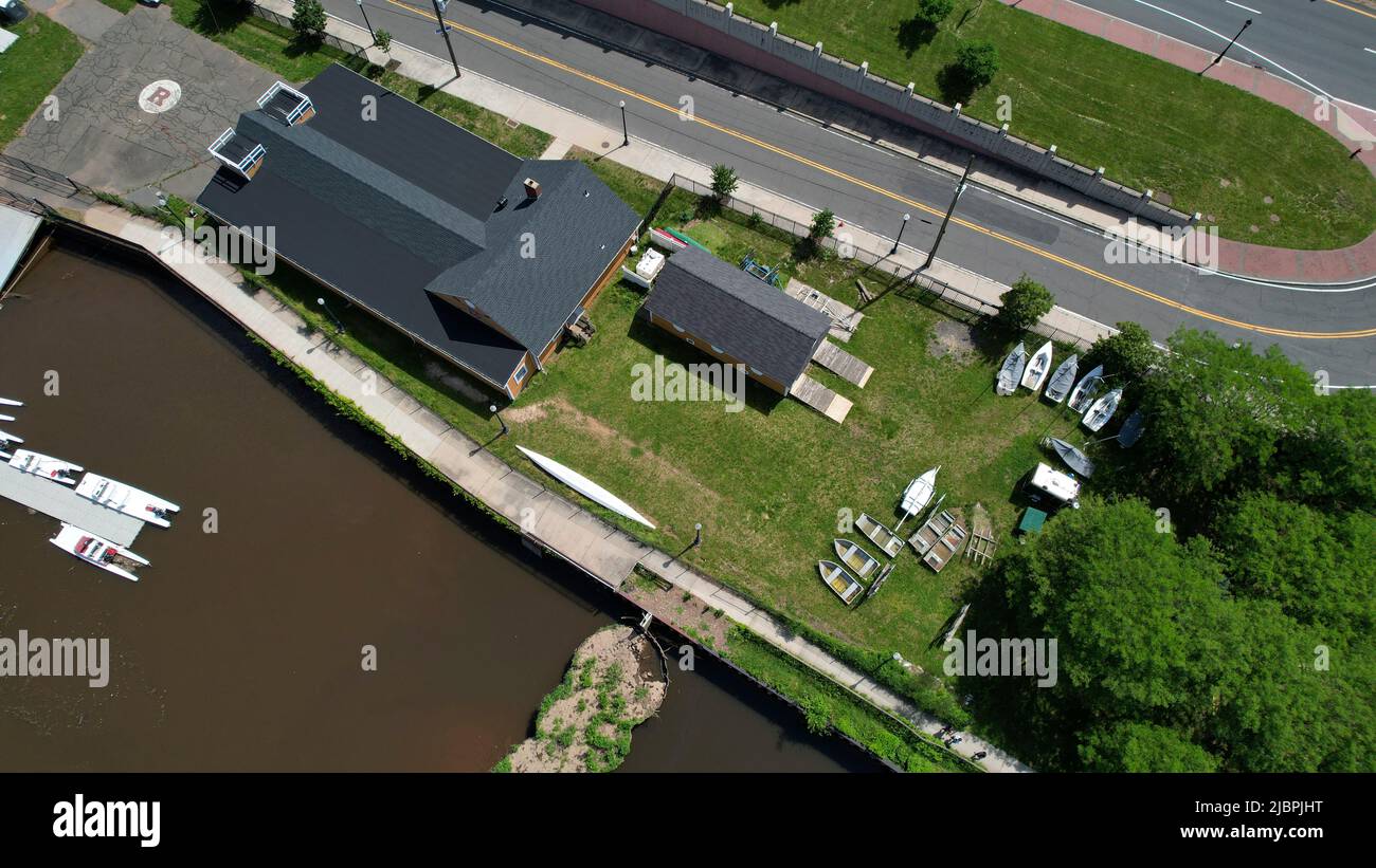 Aerial view of Rutgers Class of 1914 Boathouse on the Raritan River in New Brunswick, NJ Stock Photo