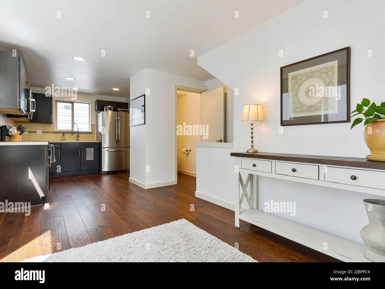 Modern residential living room and kitchen interior Stock Photo - Alamy