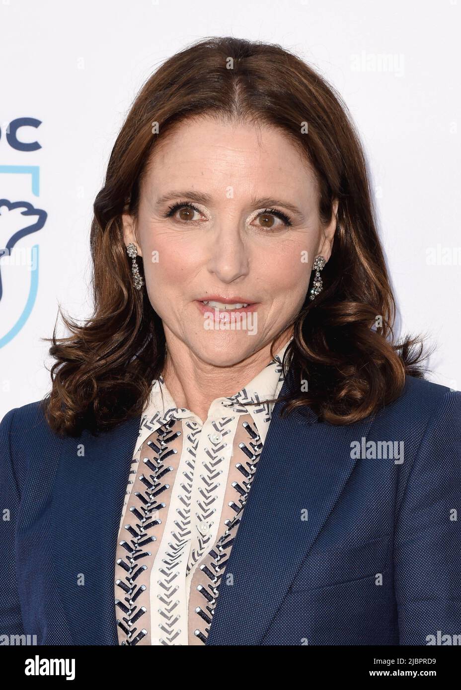 Julia Louis-Dreyfus walking on the red carpet at the NRDC night of