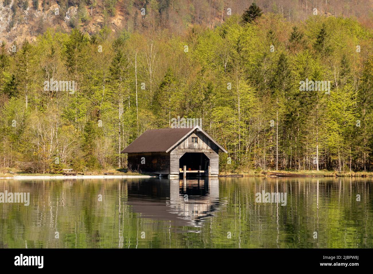Lonely boathouse at lake Koenigssee in Bavaria, Germany Stock Photo