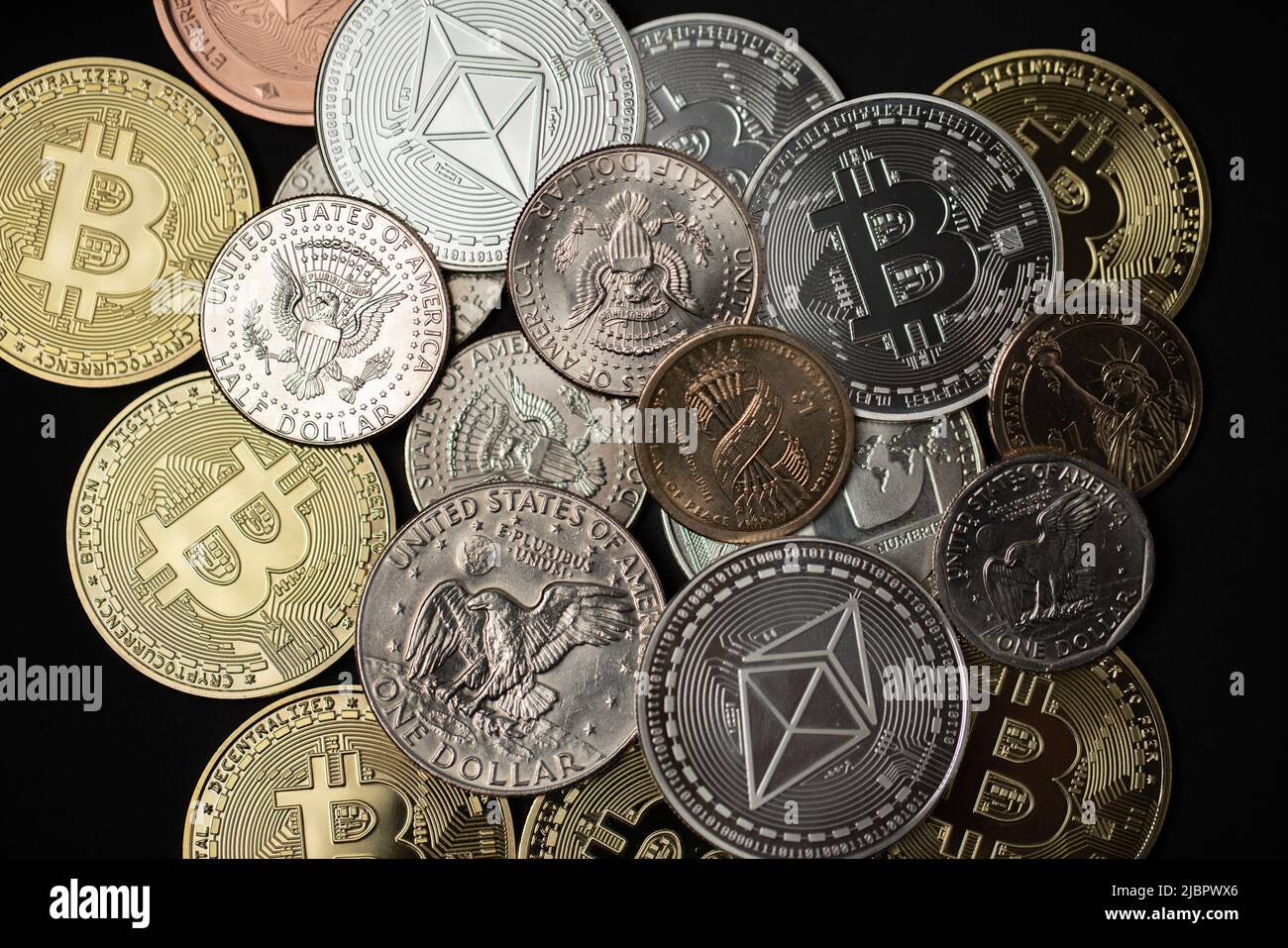One dollar coin on half dollar and gold Bitcoin coins. Digital crypto  currency Bitcoin, Ethereum and Litecoin with USD Stock Photo - Alamy