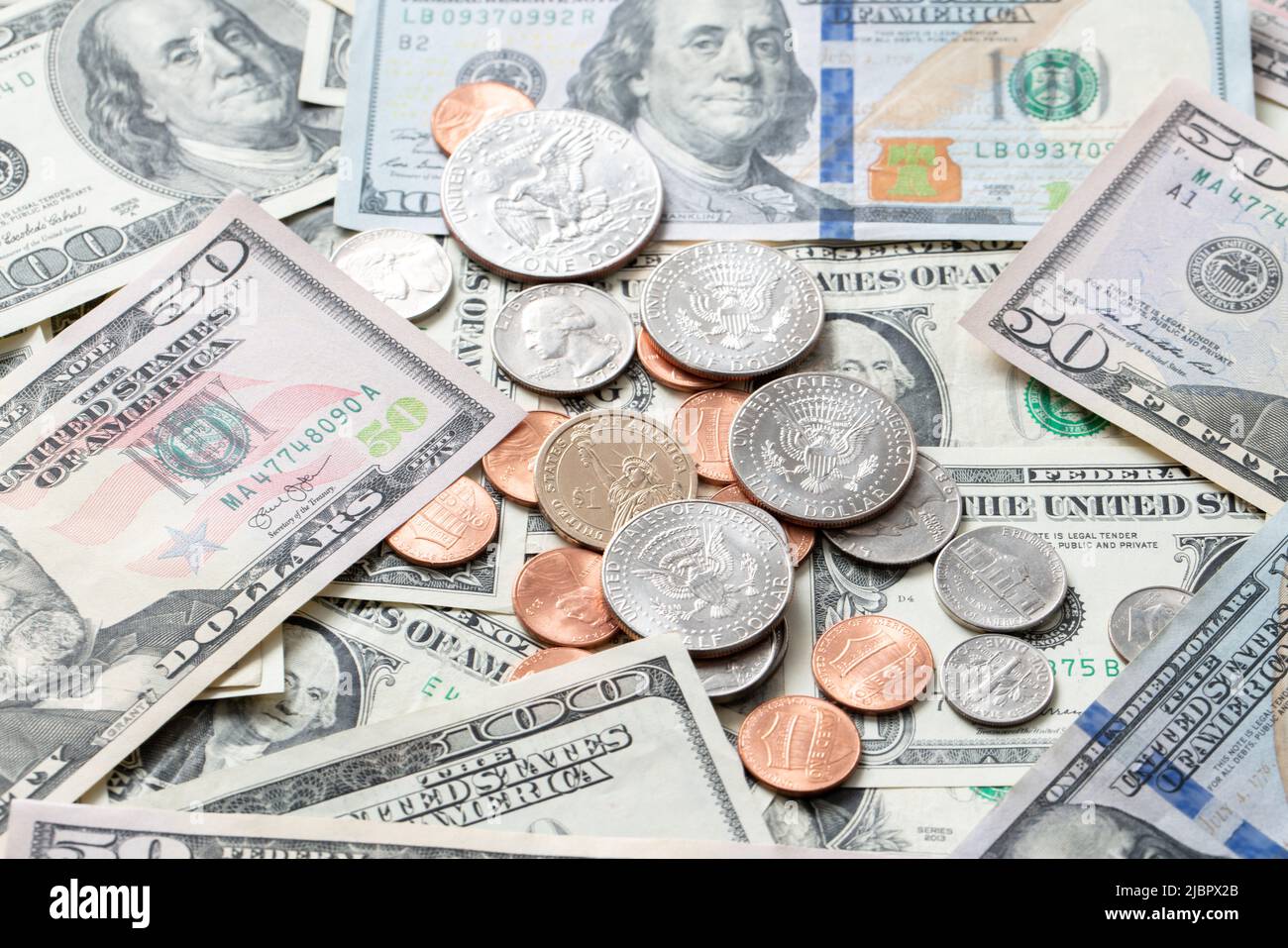 Dollar coins on banknotes from United States of America. US currency