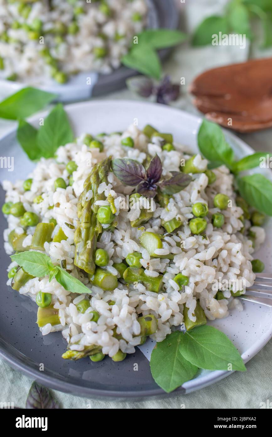 Spring food; Delicious risotto with asparagus and wild garlic Stock Photo