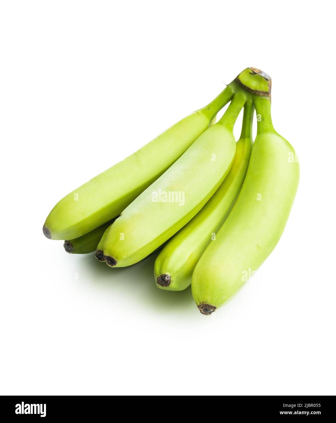 Unripe green bananas isolated on a white background Stock Photo - Alamy