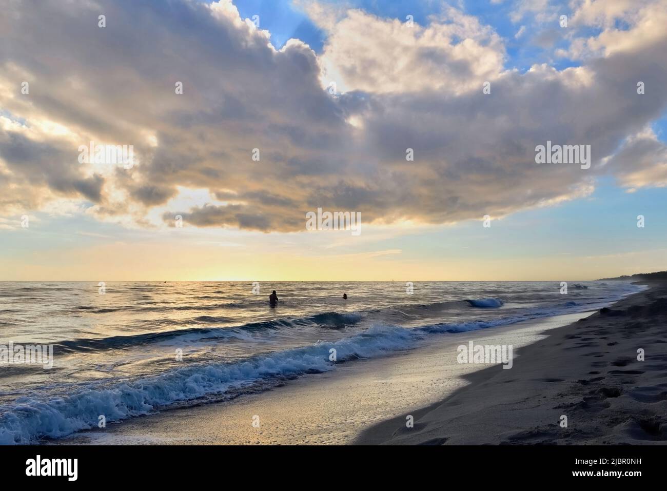 beautiful seaside landscape at dawn under cloudy sky Stock Photo