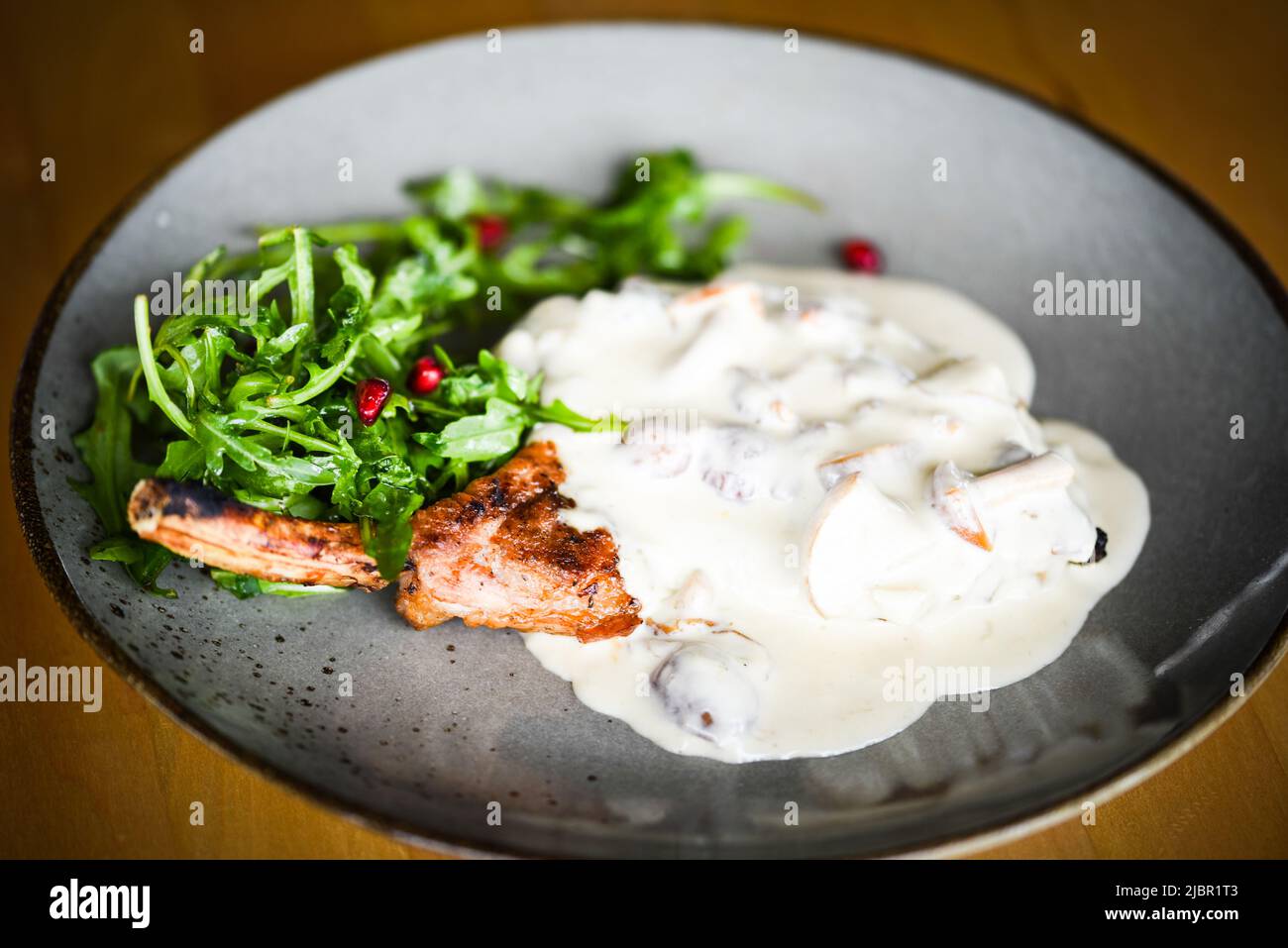 tasty pork cutlet & mushrooms sauce Stock Photo Alamy