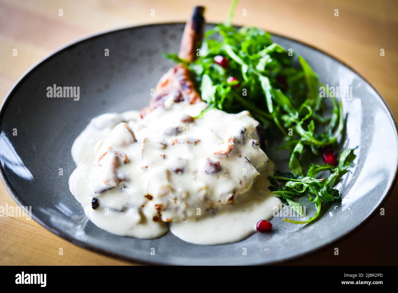 tasty pork cutlet & mushrooms sauce Stock Photo - Alamy