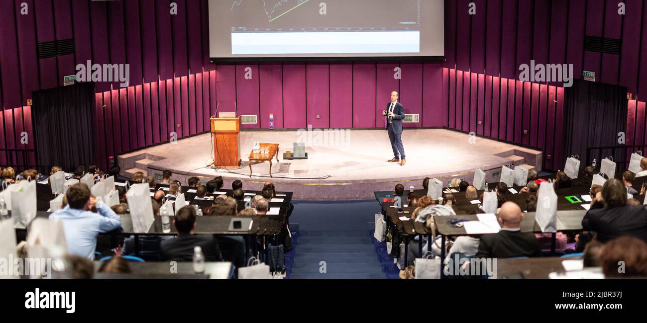 Speaker giving presentation on business conference event. Stock Photo
