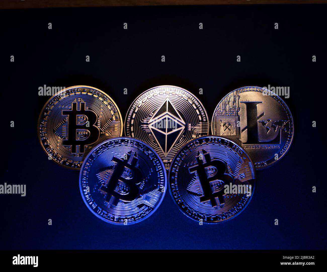 Crypto coins on dark background. Bitcoin, Ethereum and Litecoin coins. Blockchain Technology concept Stock Photo