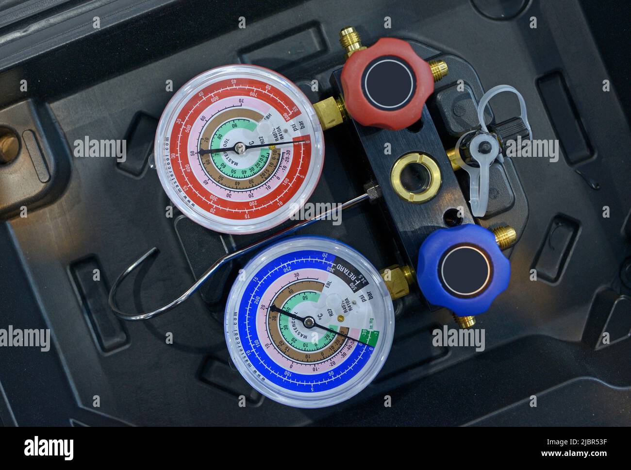 Manifold gauges and automation working, close up Stock Photo Alamy