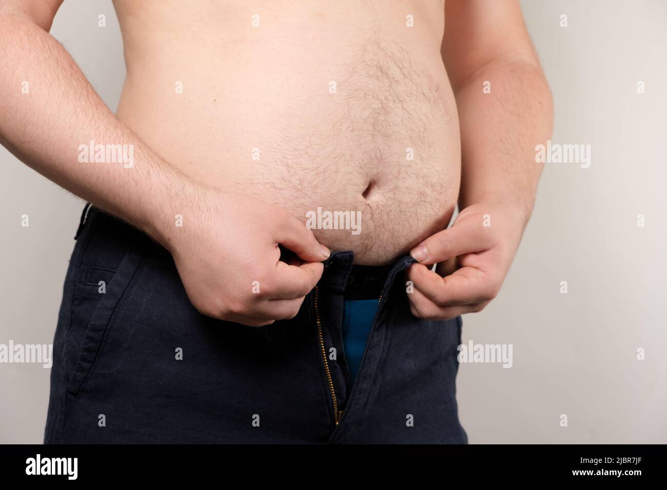 Man loss weight pants hi-res stock photography and images - Alamy