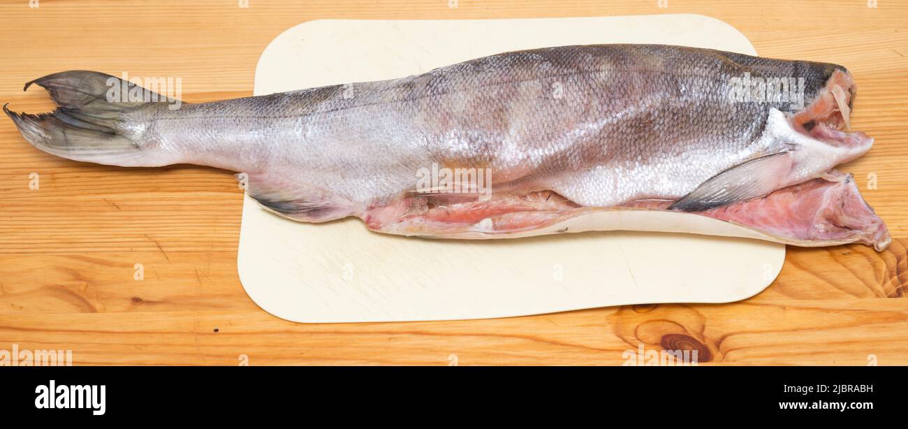 Top view of chum salmon on wooden table Stock Photo
