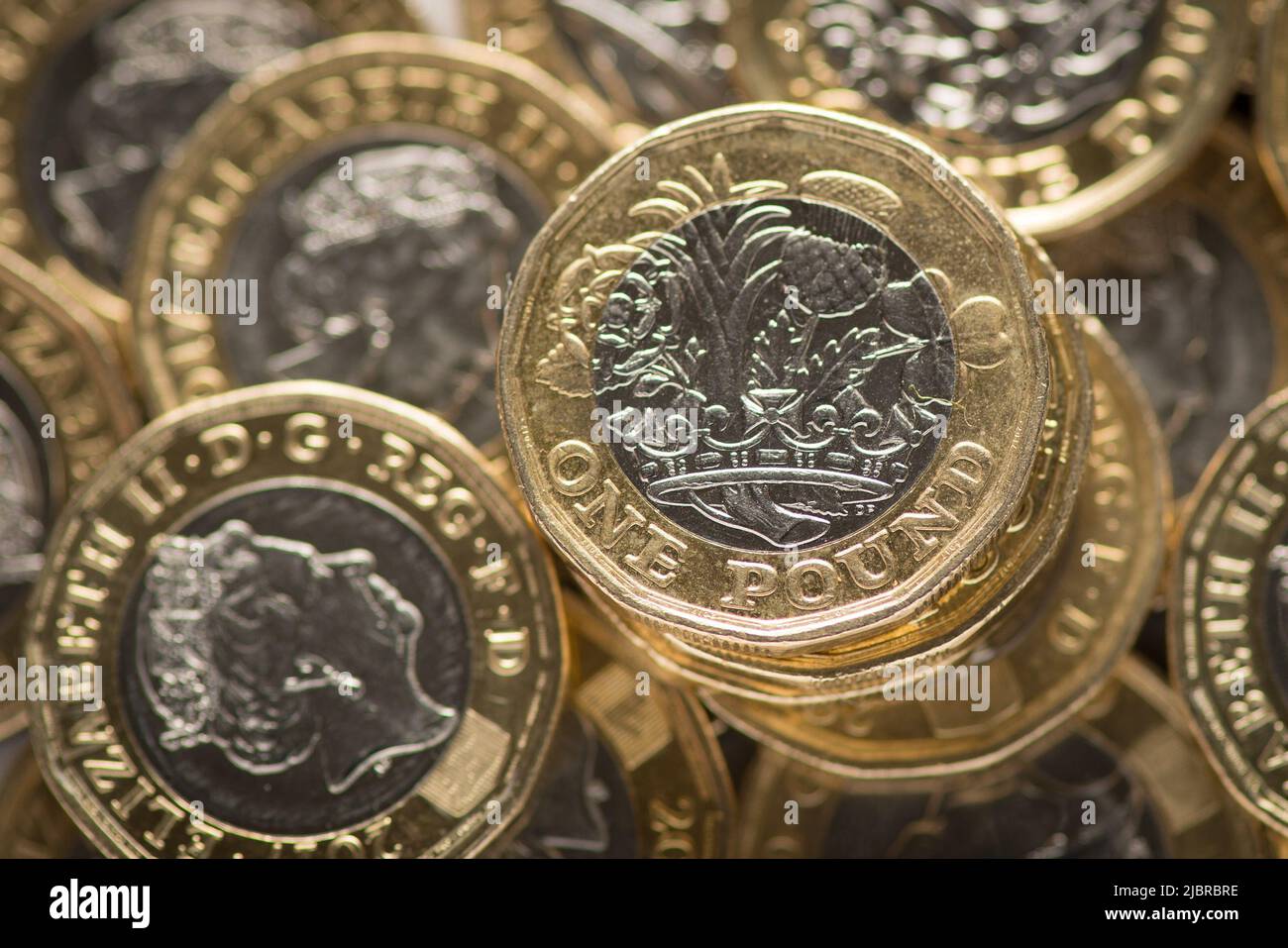 File photo dated 26/01/18 of British one pound coins. The UK's economic growth is expected to be slower than first thought this year and will stagnate in 2023, experts at the Organisation for Economic Co-operation and Development (OECD) have warned. Issue date: Wednesday June 8, 2022. Stock Photo