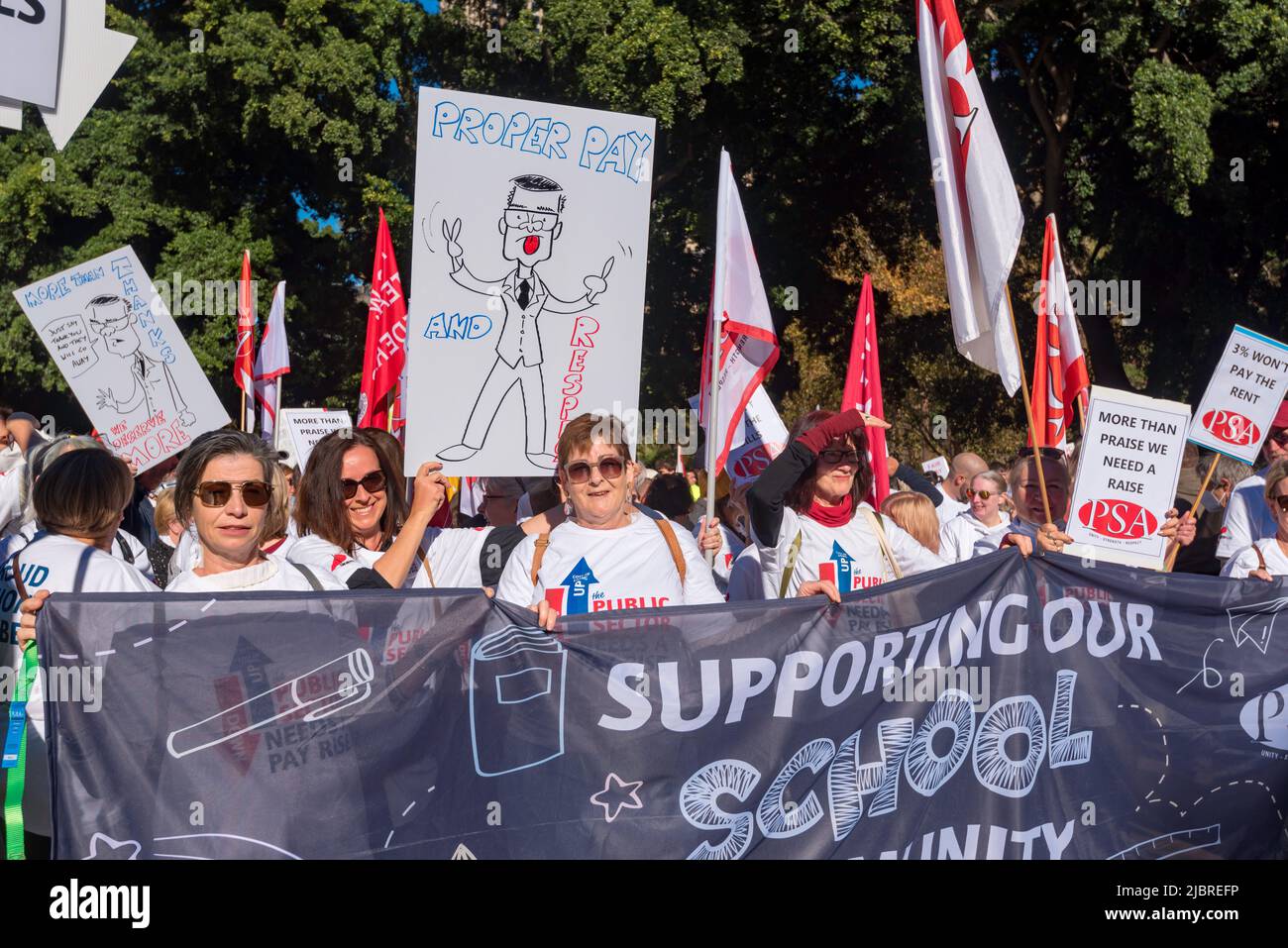 June 8th, 2022, Sydney, Australia: New South Wales Public Sector workers on a 24hr strike, marched on Parliament House in Macquarie Street, Sydney today rejecting a 3% pay rise offer and unhappy that only certain 'front line' workers were awarded an additional $3,000.00 Covid-19 bonus. Stock Photo