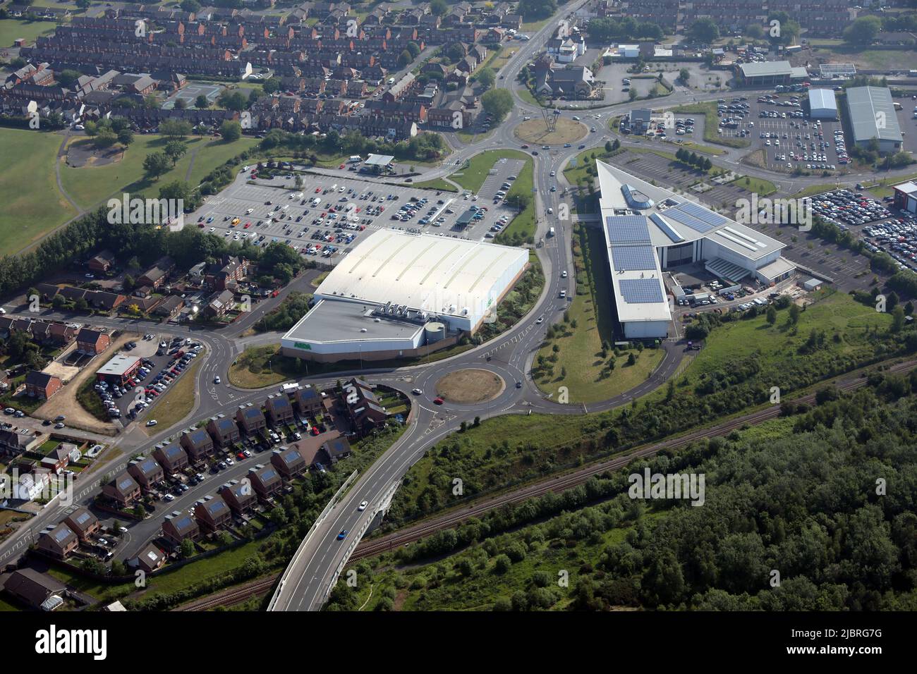 aerial view of Wakefield College Castleford Campus (V-shaped building on the right) & Asda Glasshoughton Superstore, Castleford, West Yorkshire Stock Photo