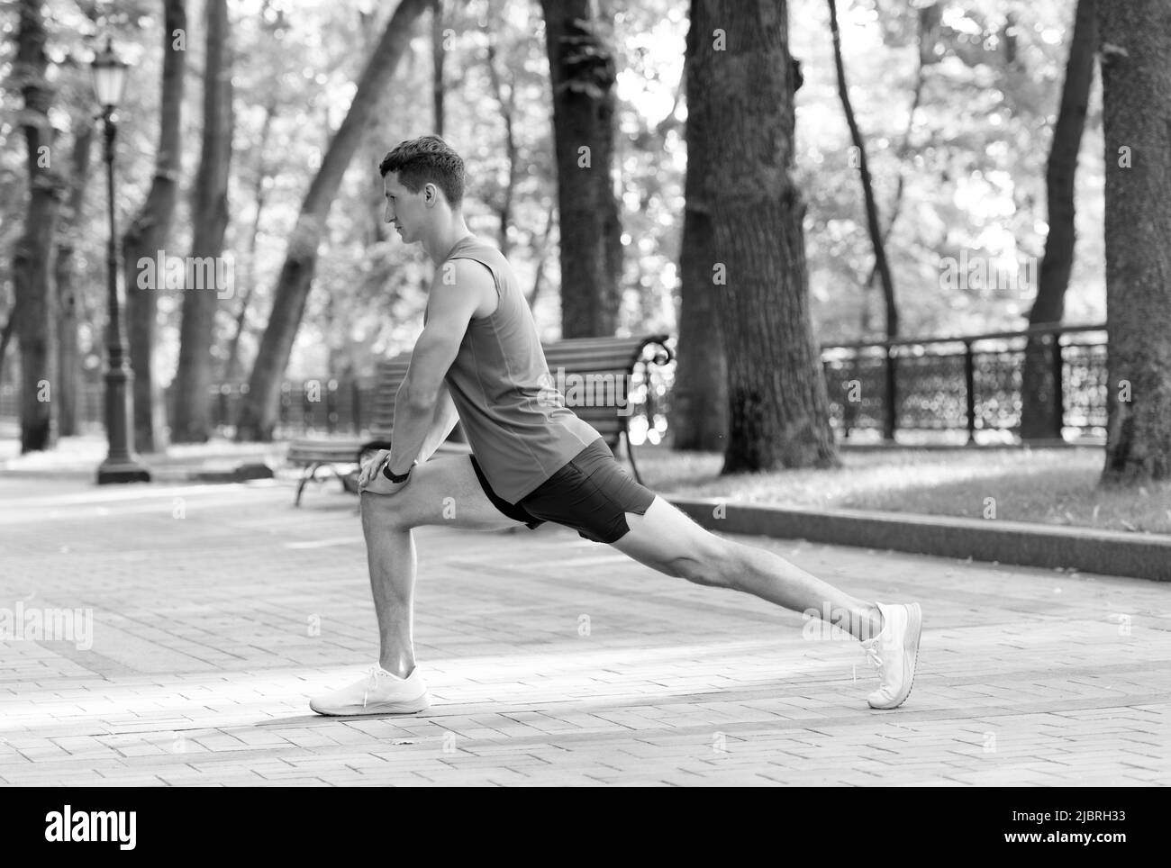 Lunge position Black and White Stock Photos & Images - Alamy