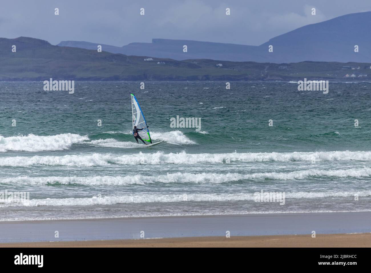 Windsurfer at Carrownisky Beach, County Mayo, Ireland Stock Photo