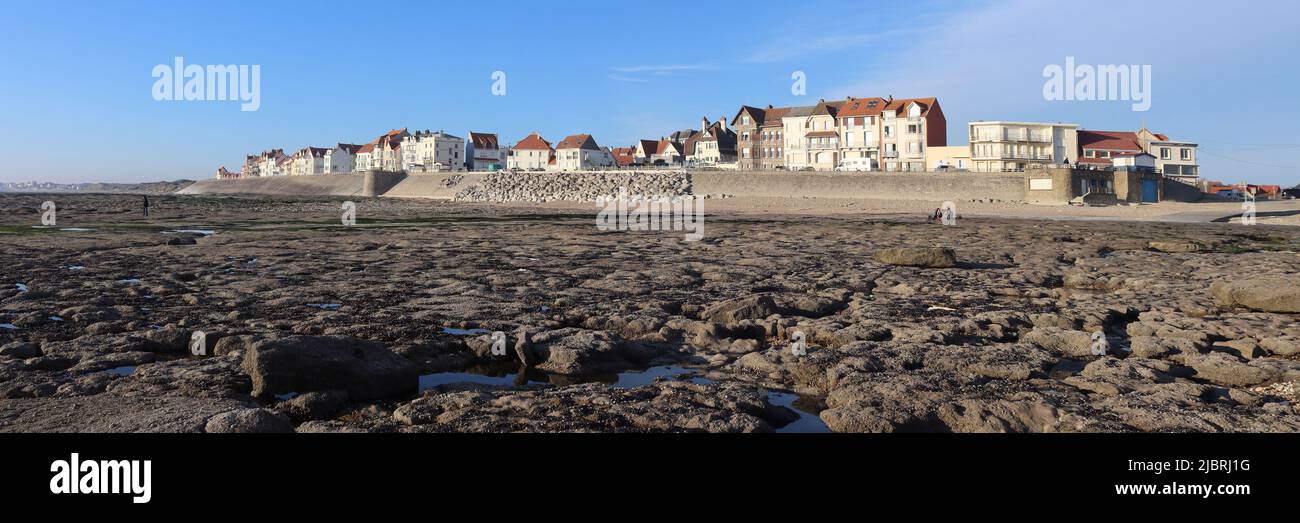 Panoramic view of the resort town of Ambleteuse, from the beach on the beautiful Opal Coast of Northern France. Sunny spring evening, with low tide an Stock Photo