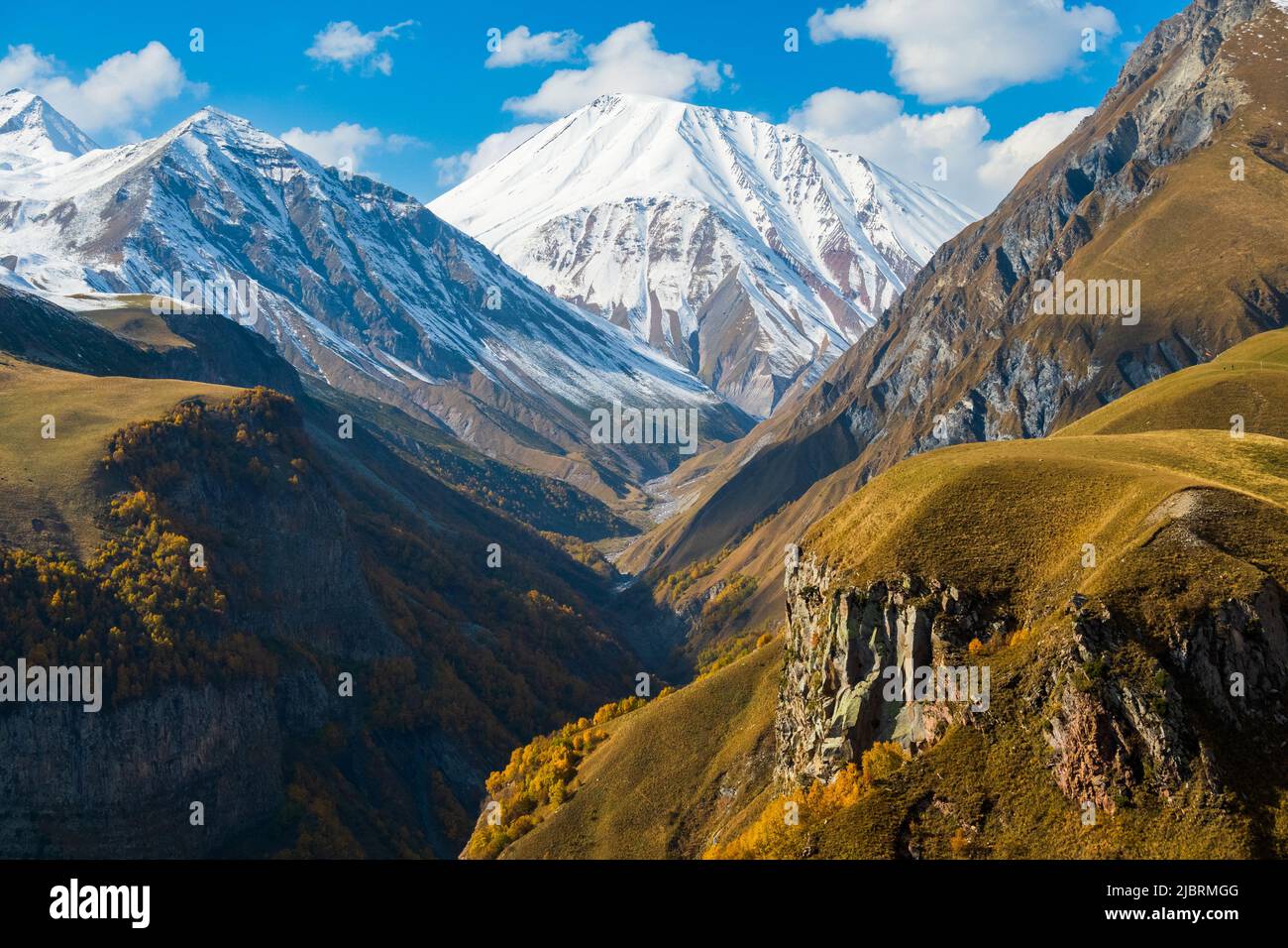 Mountain ridge with snowy peaks Stock Photo - Alamy