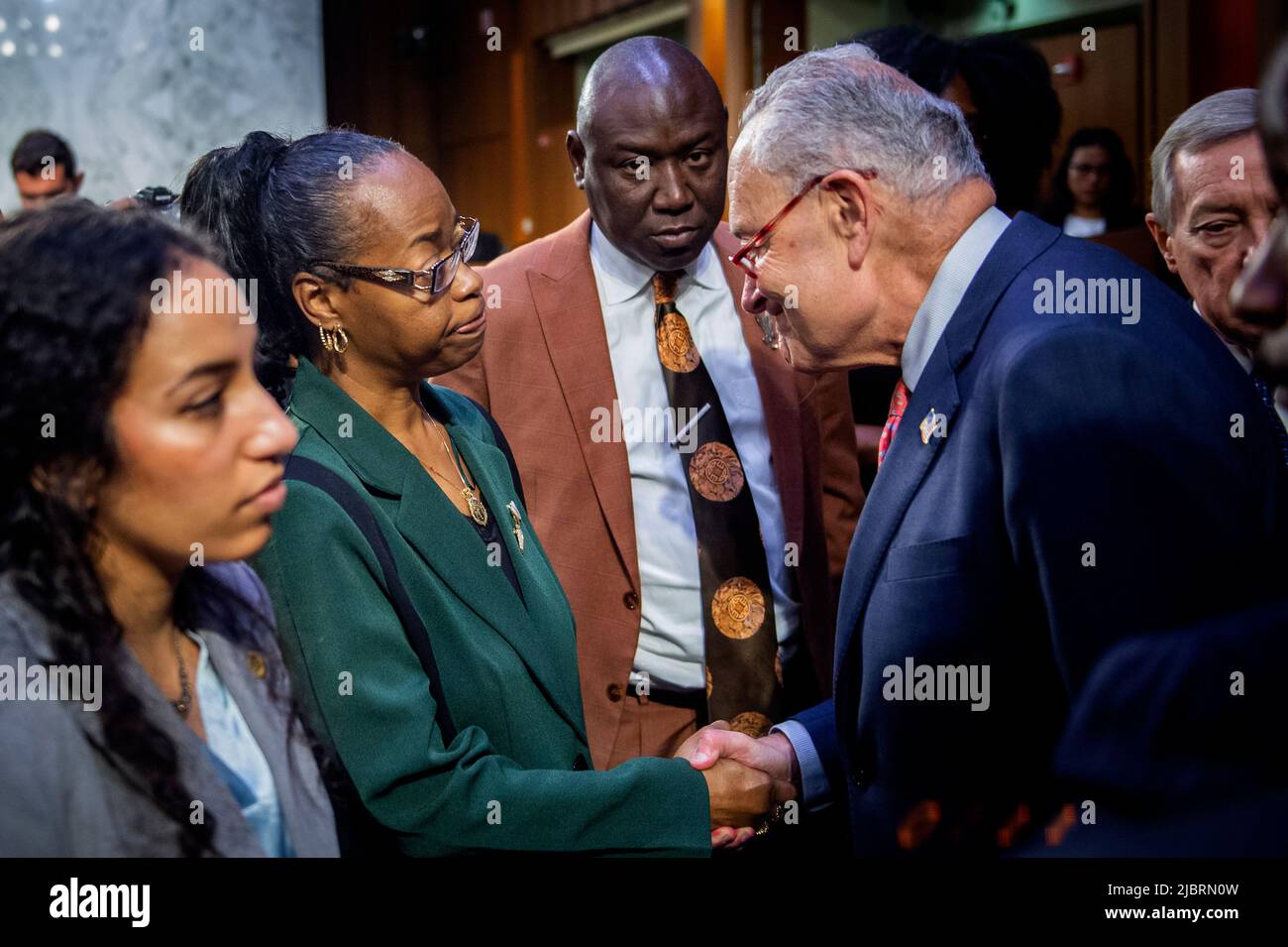 Washington, United States Of America. 07th June, 2022. Kimberly Salter, left, wife of Tops Security Guard Aaron Salter, Jr., who died in the Buffalo, New York, Tops supermarket mass shooting implores for United States Senate Majority Leader Chuck Schumer (Democrat of New York), right, to “do something”, following a Senate Committee on the Judiciary hearing to examine domestic terrorism threat after the Buffalo attack, in the Hart Senate Office Building in Washington, DC, Tuesday, June 7, 2022. Credit: Rod Lamkey/CNP/Sipa USA Credit: Sipa USA/Alamy Live News Stock Photo