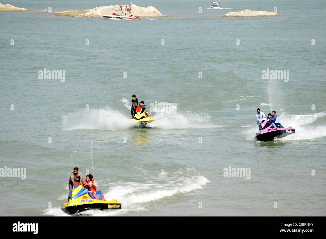 Khanpur. 8th June, 2022. Tourists enjoy jet-ski riding at Khanpur Lake in Khanpur of Pakistan's northwestern Khyber Pakhtunkhwa province on June 8, 2022. Credit: Ahmad Kamal/Xinhua/Alamy Live News Stock Photo