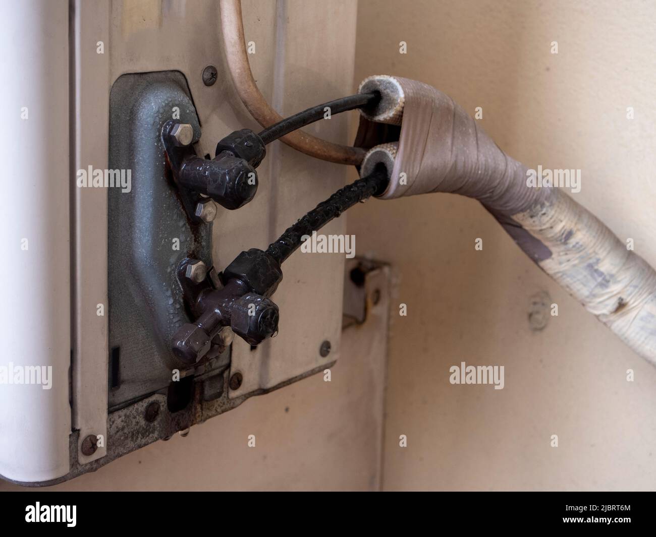 AC outdoor compressor pipe connection Stock Photo