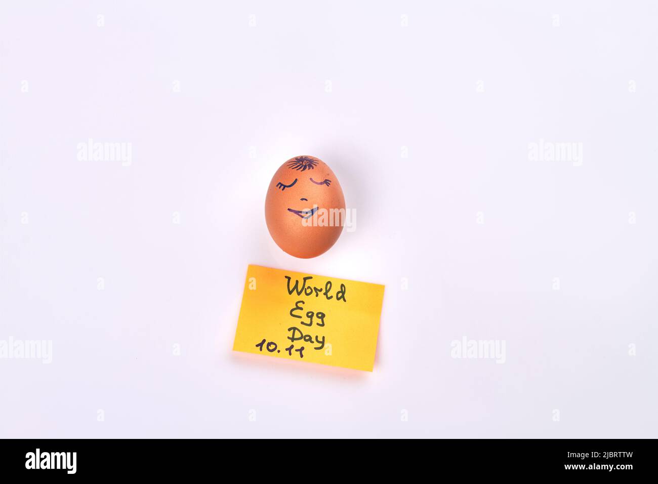 Chicken egg with funny drawn face isolated on white background. World ...