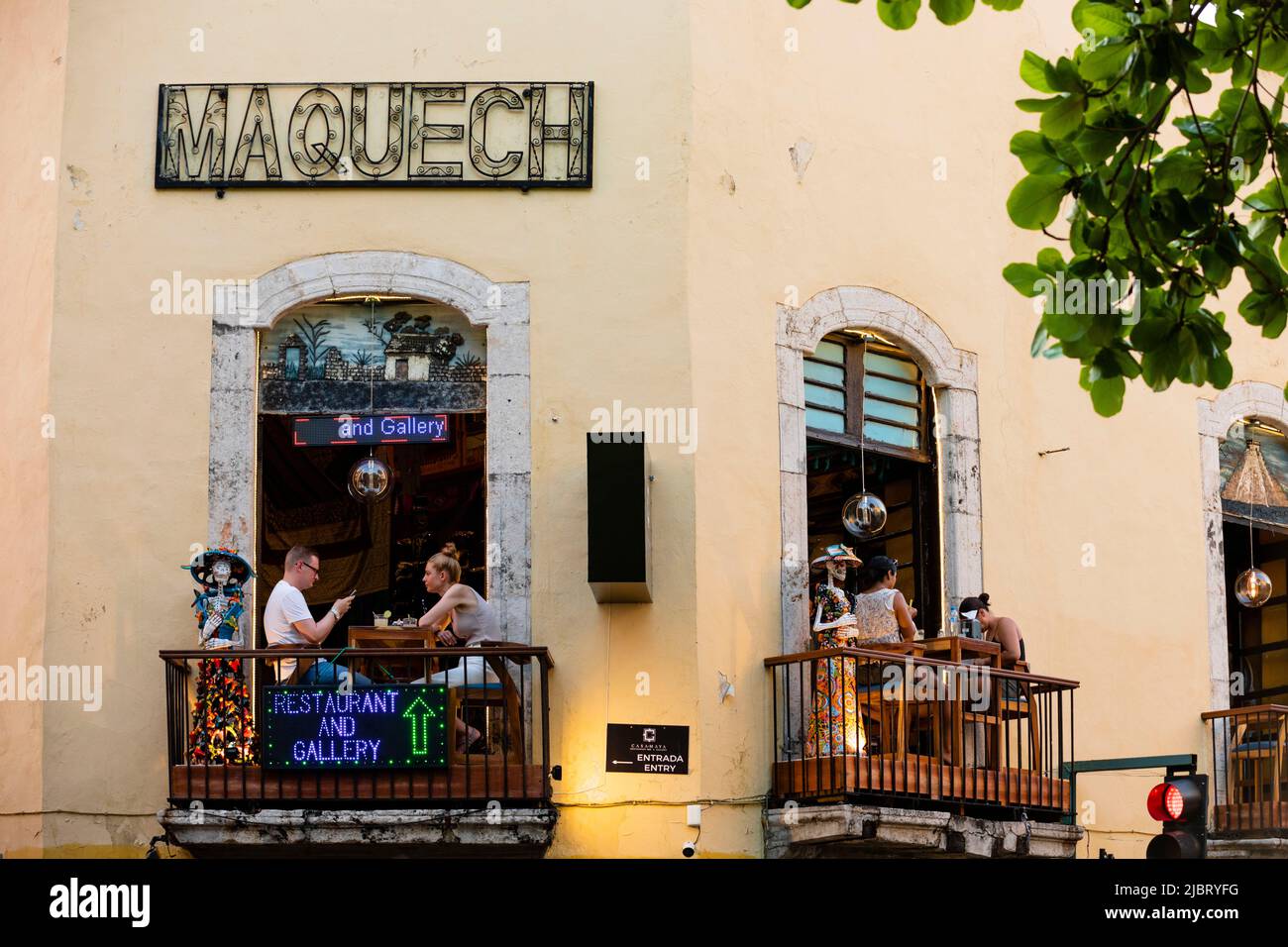 Mexico, state of Yucatán, Merida capital of Yucatán, people having a drink on the balcony Stock Photo