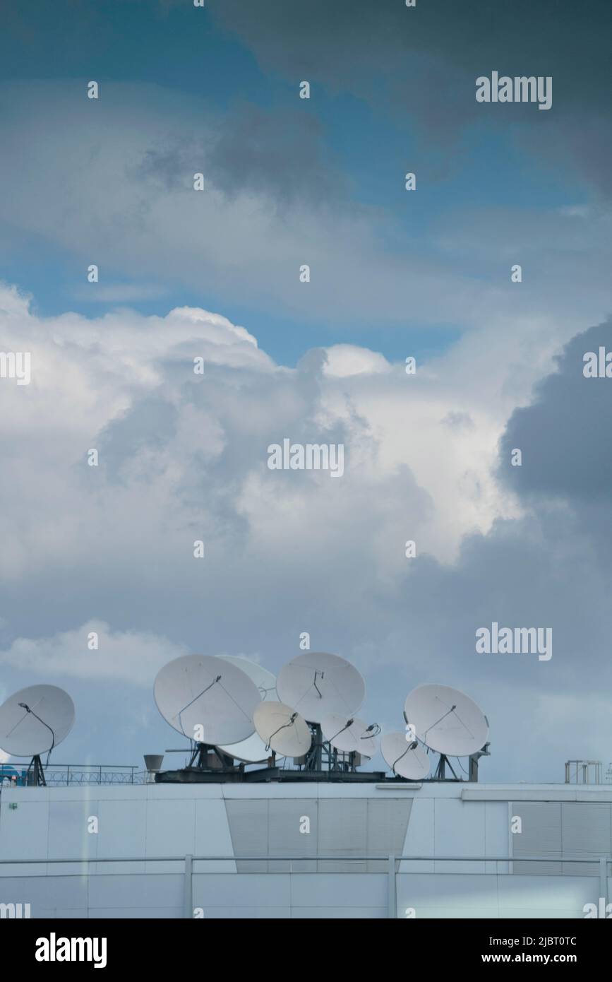 France, Seine Saint Denis, Saint Ouen, satellite dishes on the roof of a building Stock Photo